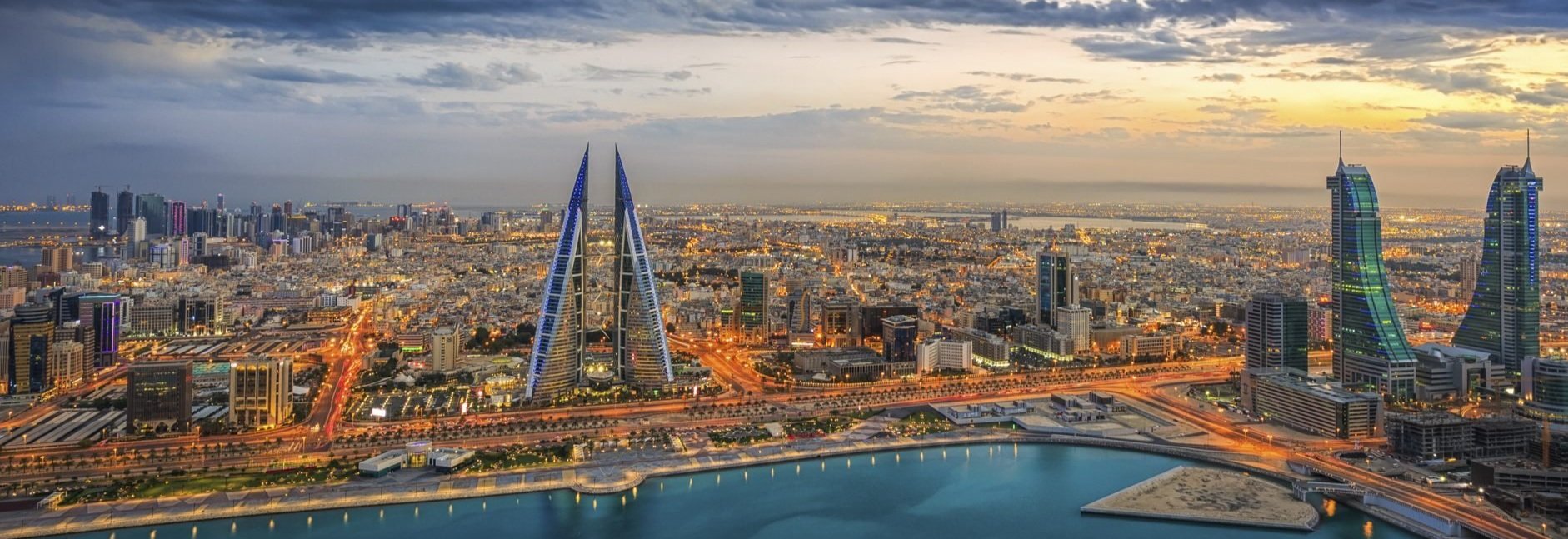 Bahrain World Trade Center - Modern triangular skyscrapers with blue lighting
